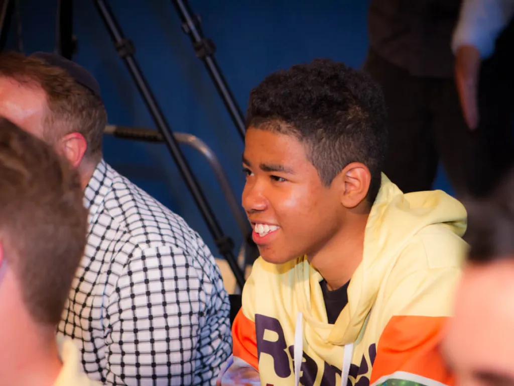 Young man attending BOND event